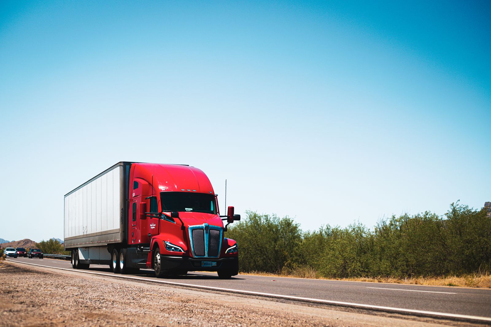 A long-haul truck on an open highway.